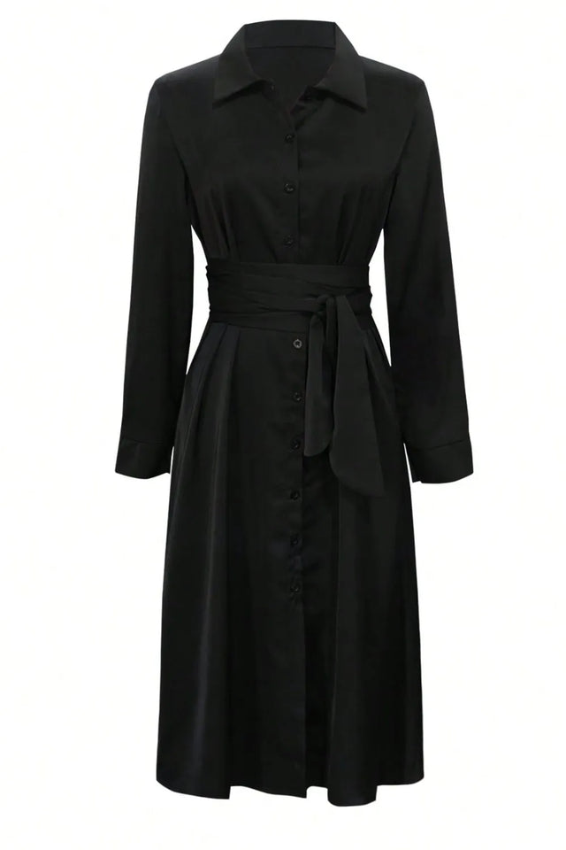 Black dress with a belt on a white background