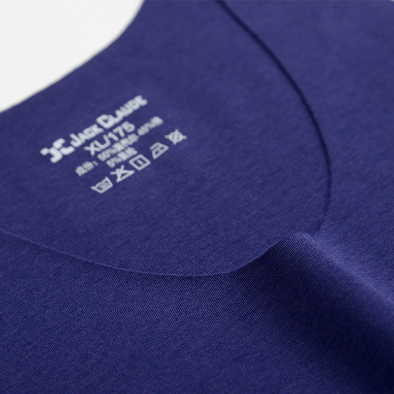 Close-up of a blue garment with a label on a white background