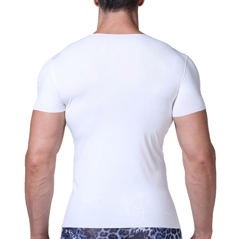 Person wearing a white t-shirt on a plain background