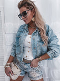 Woman wearing a stylish denim outfit with sunglasses and a handbag against a white background