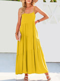 Woman wearing a yellow dress with a white background