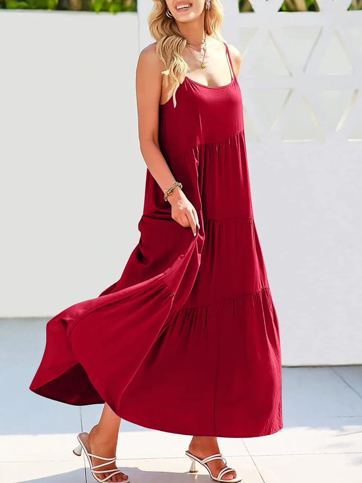 Woman wearing a red dress with a white background