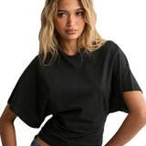Woman wearing a black oversized t-shirt on a white background