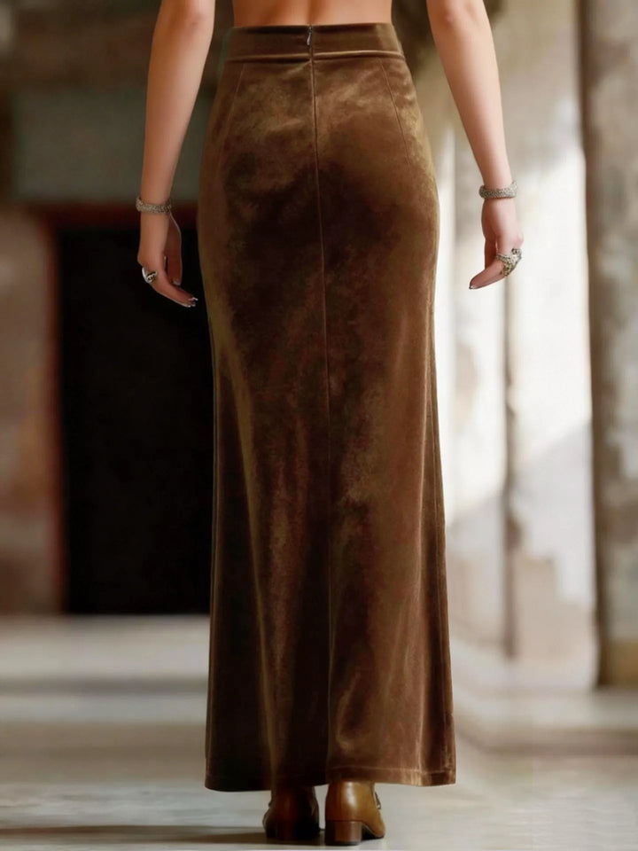 Brown velvet skirt worn by a person in an indoor setting