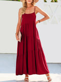 Woman wearing a red dress with a white background