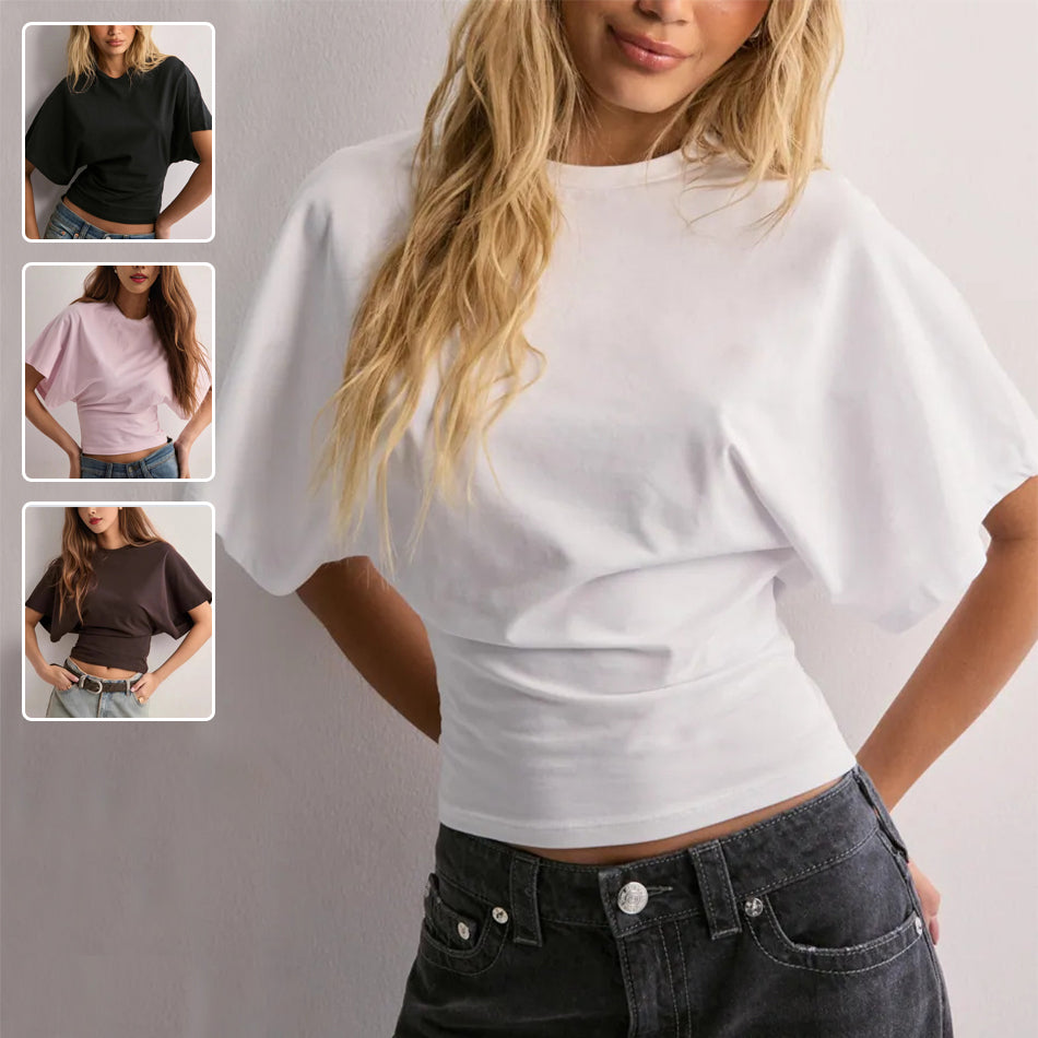 Woman wearing a white crop top with inset images showing the top in black, pink, and brown.