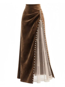 Brown velvet skirt with white mesh panel and decorative buttons on a white background