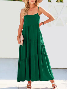 Woman wearing a green dress with a white background